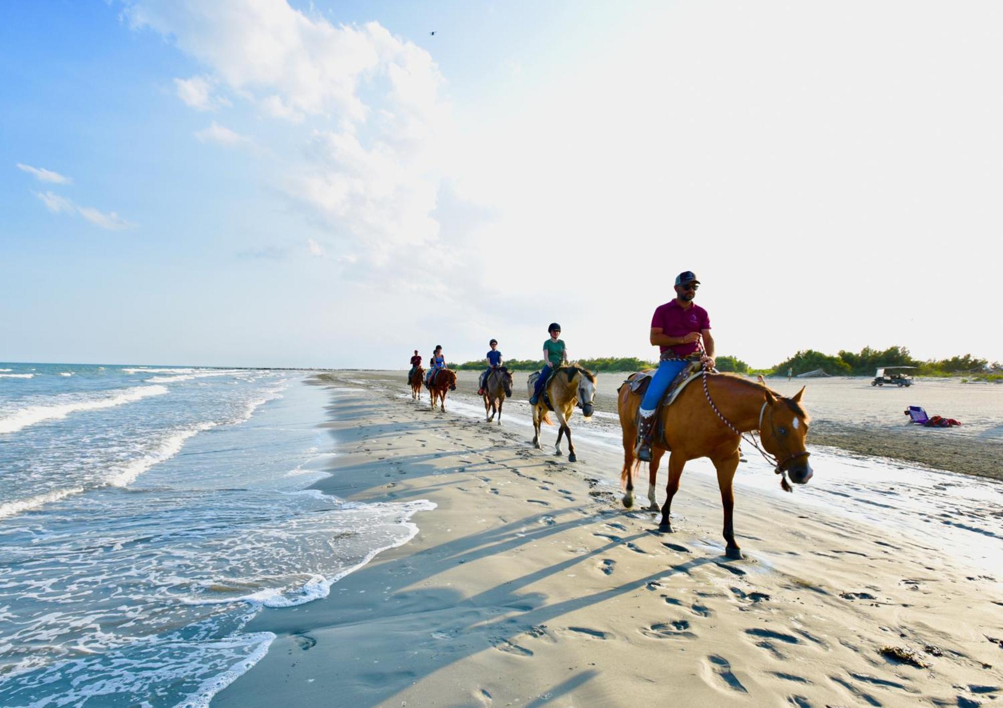 Barricata Holiday Village Скардовари Экстерьер фото Horseback riders on the beach at Fort Raleigh National Historic Site
